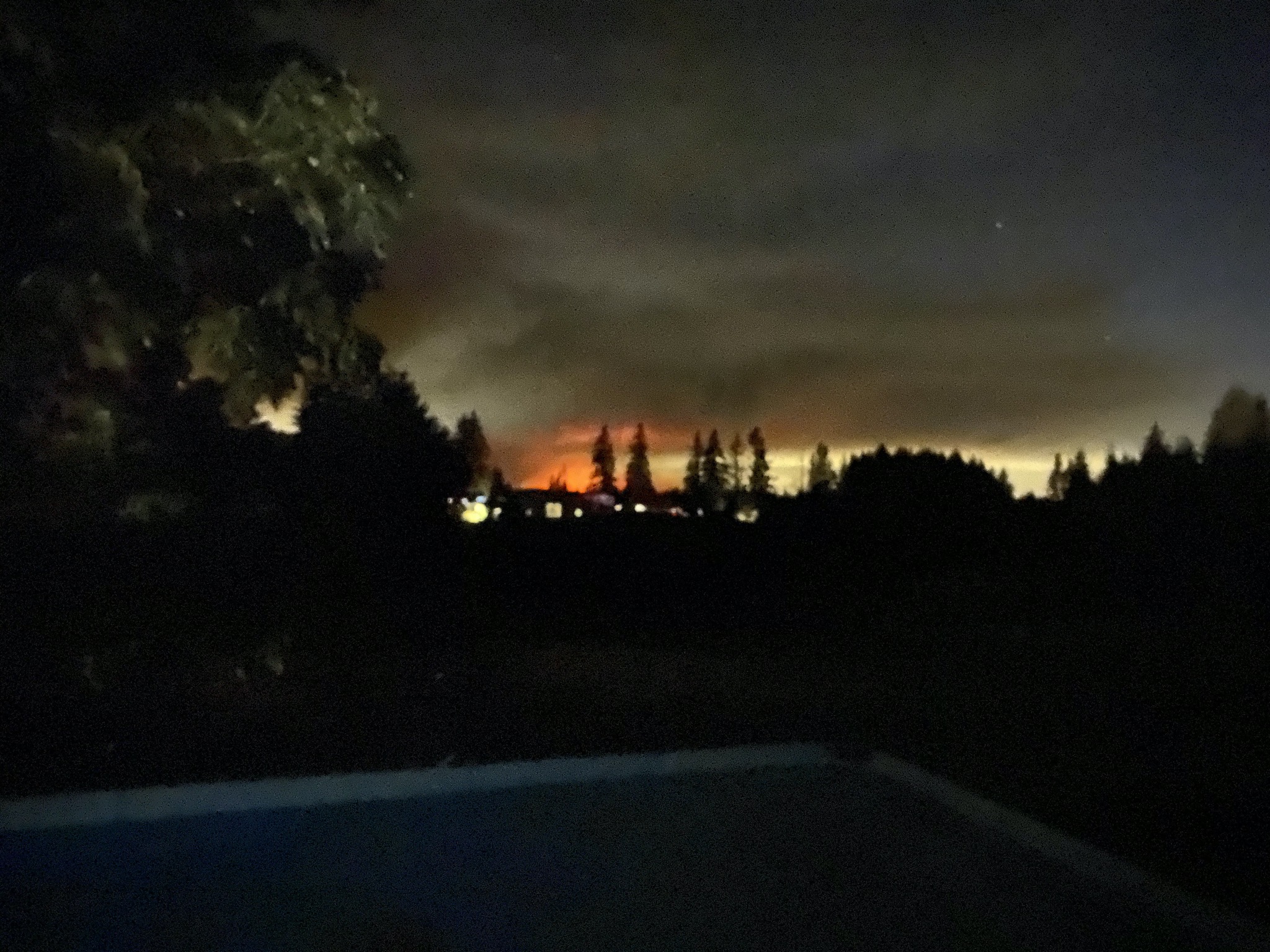 Glow of fire in the distance
