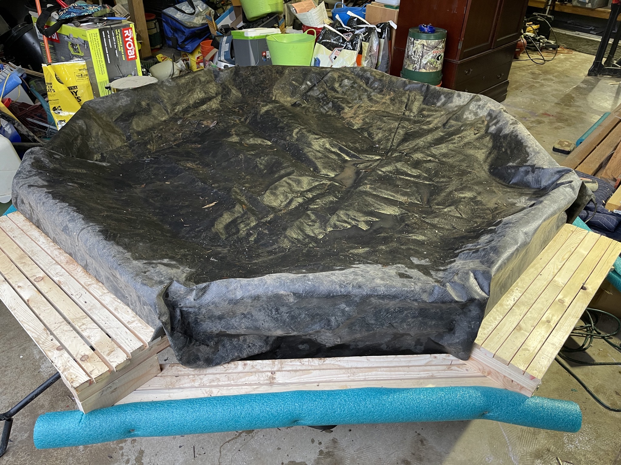 Pond island with liner and bumpers