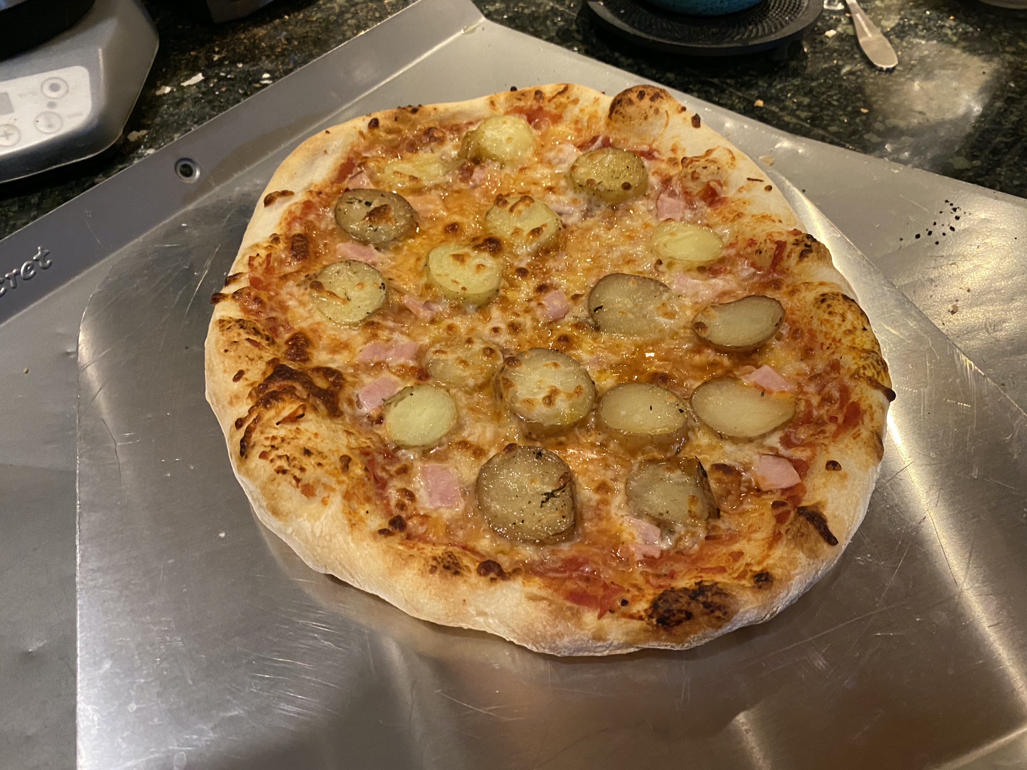 Roast potato and Canadian bacon pizza