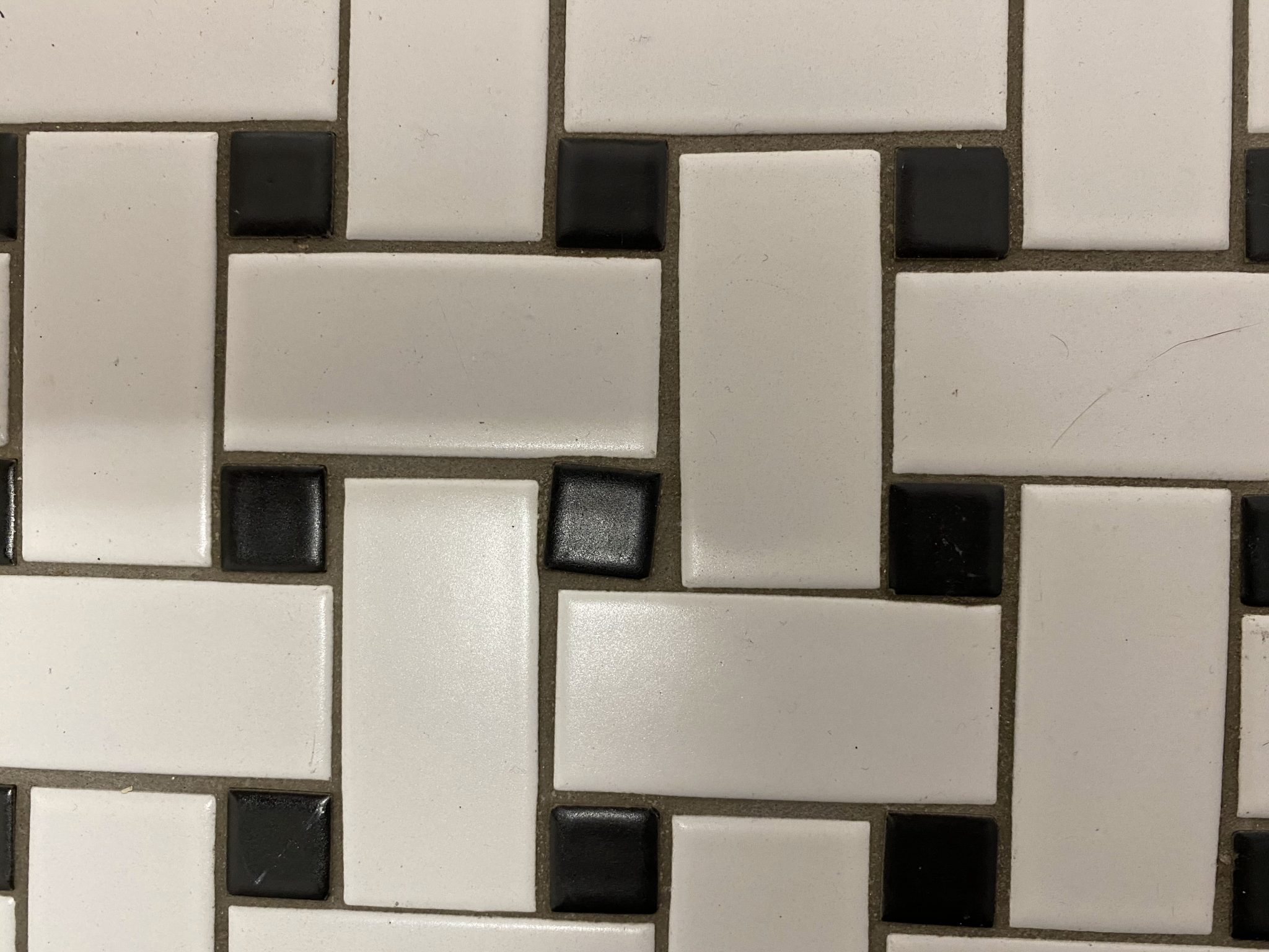 A sign of hand-laid tiles