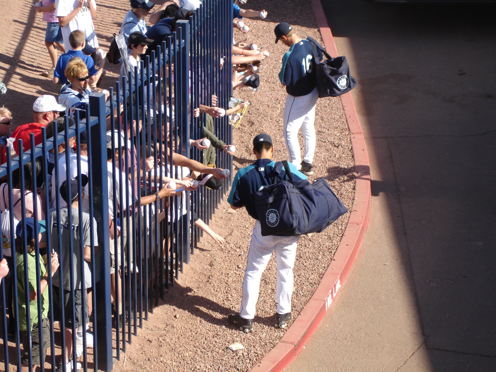 Signing balls for fans