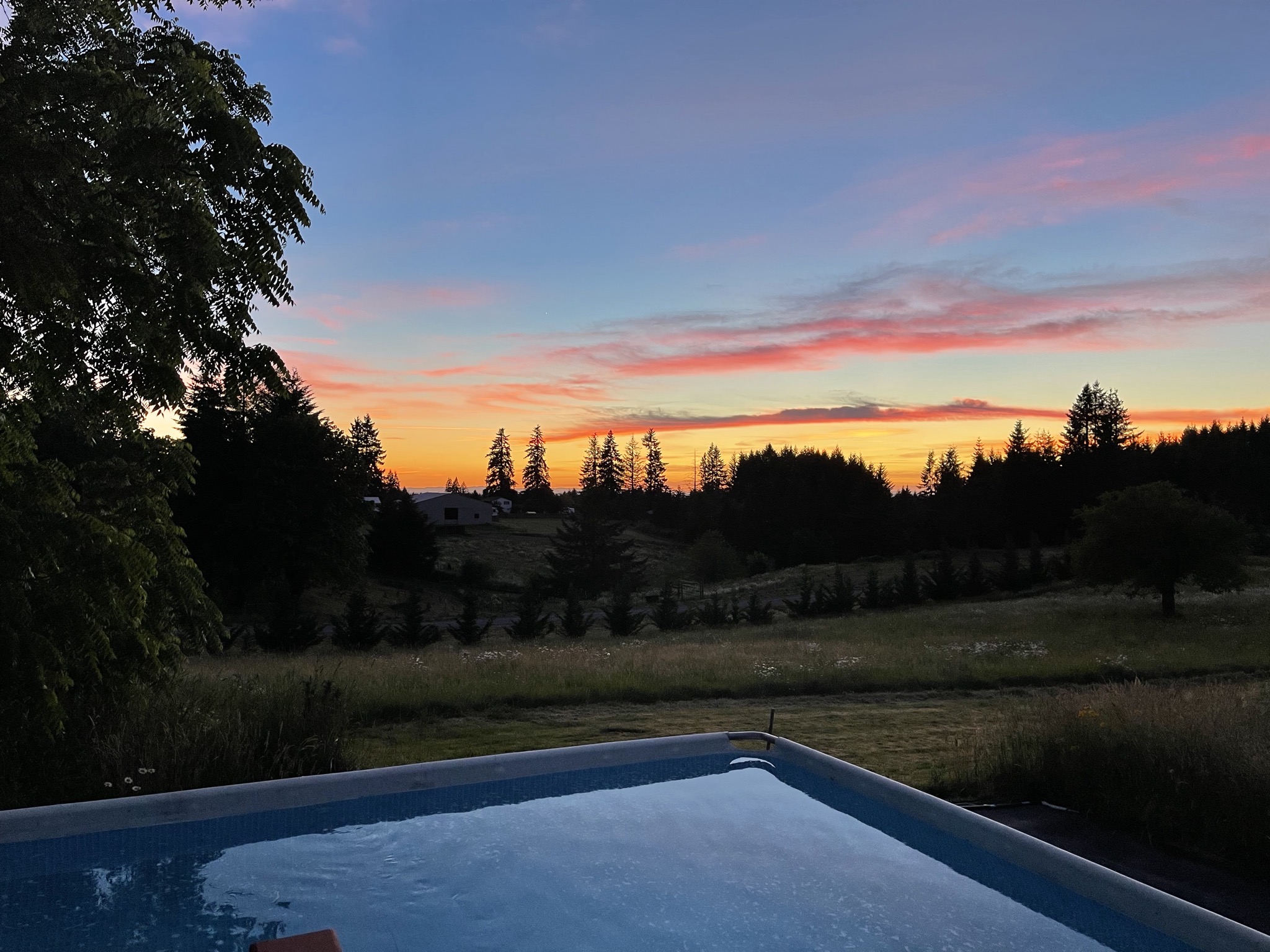Sunset over our pool