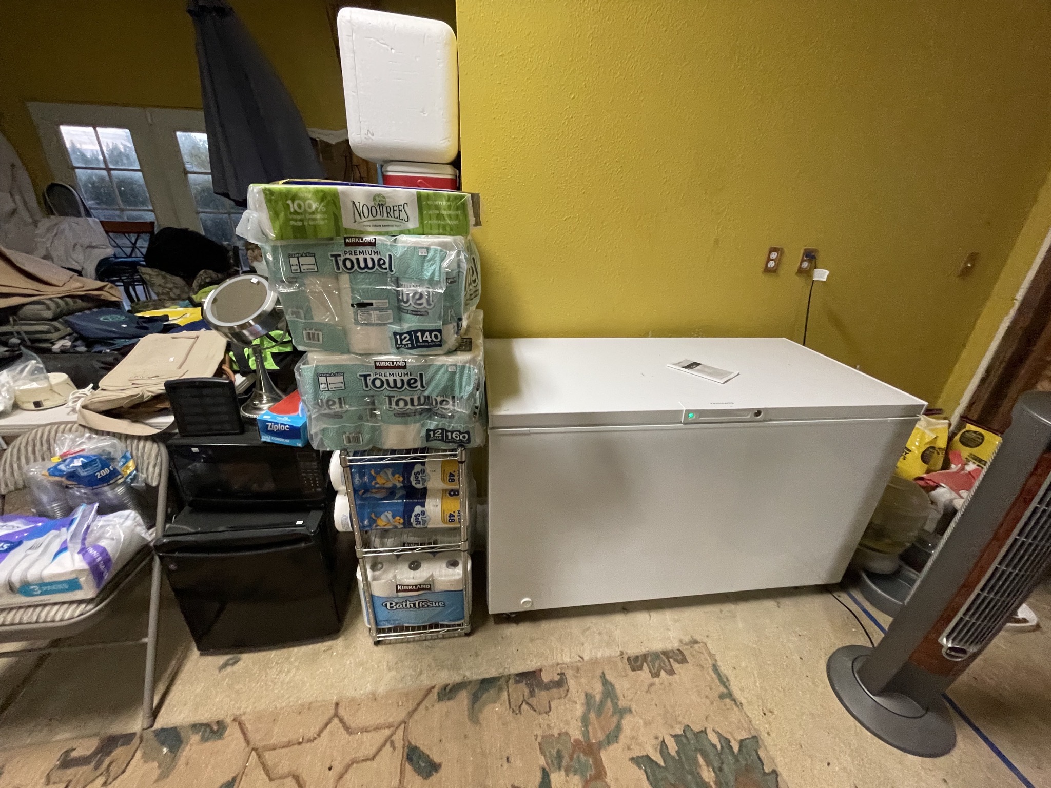 Mini-fridge, microwave, freezer, paper products