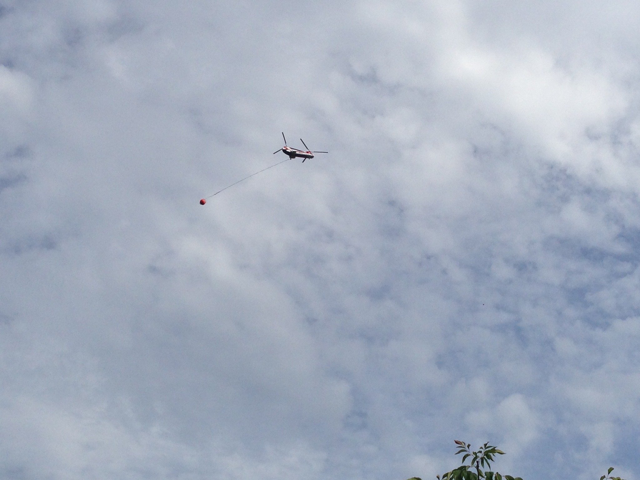 Helicopter with water bucket
