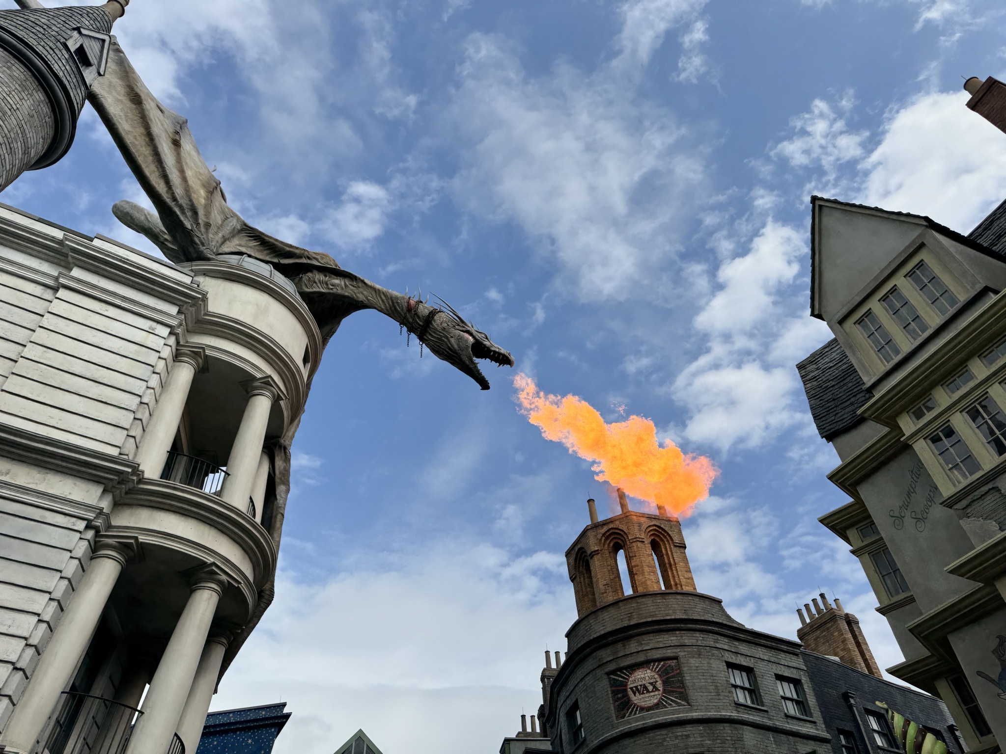 Fire breathing dragon atop a building