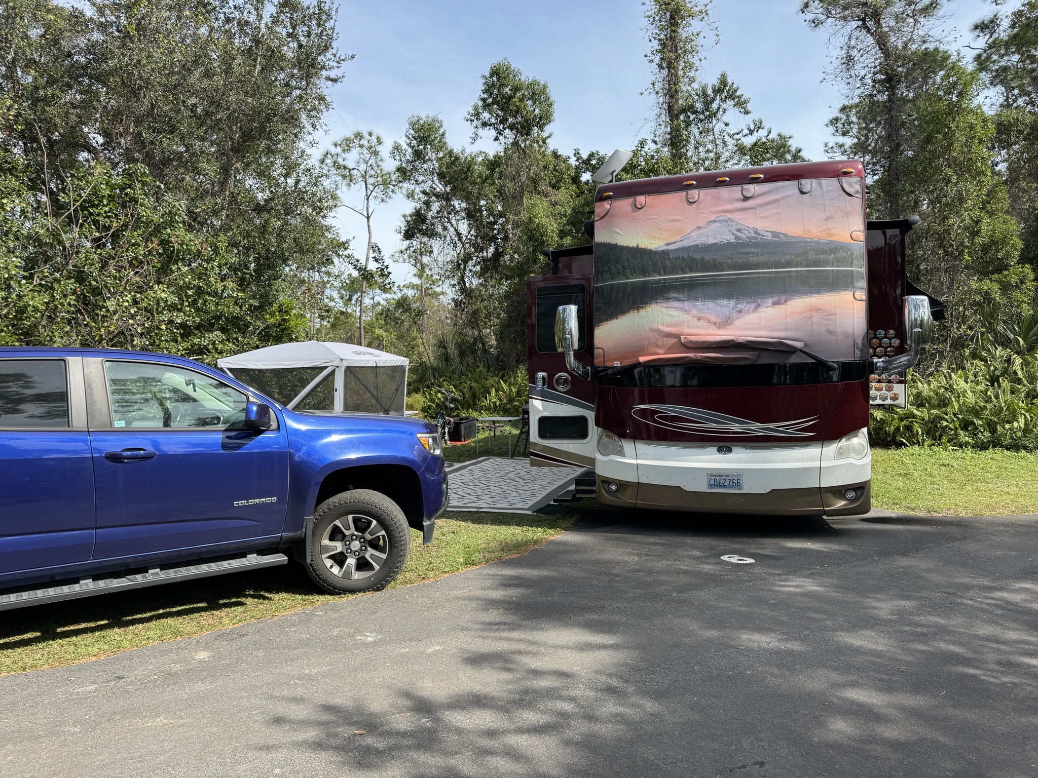 Truck and motorhome in campsite